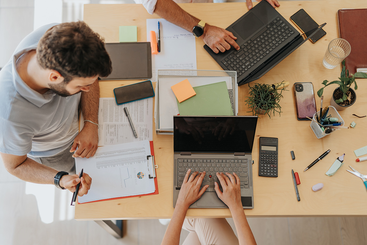 Brand,Management,Professionals,Collaborating,In,An,Office, Brand management professionals collaborating in an office,